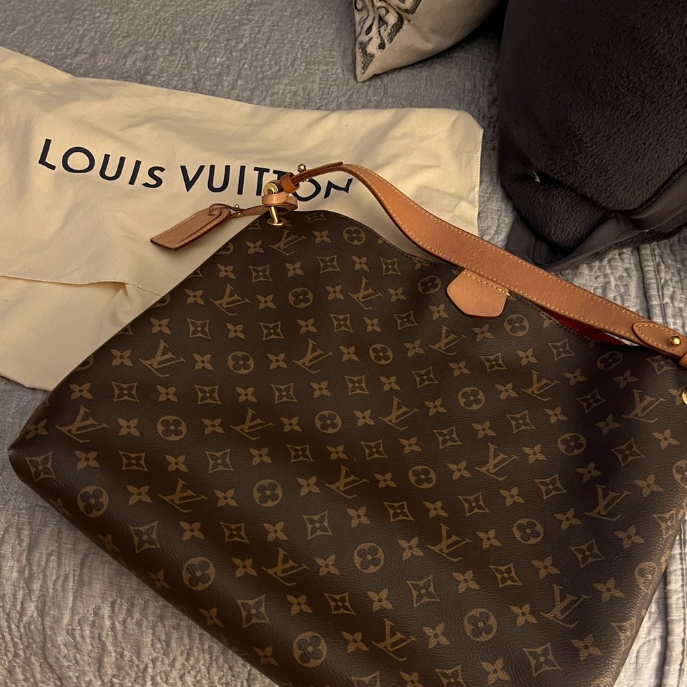 A Louis Vuitton MM Graceful. Purchased at Louis Vuitton NYC. .
